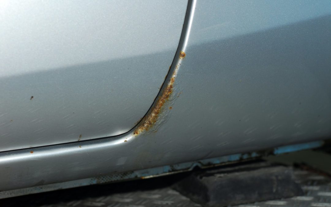 Rust and corrosion on a car door
